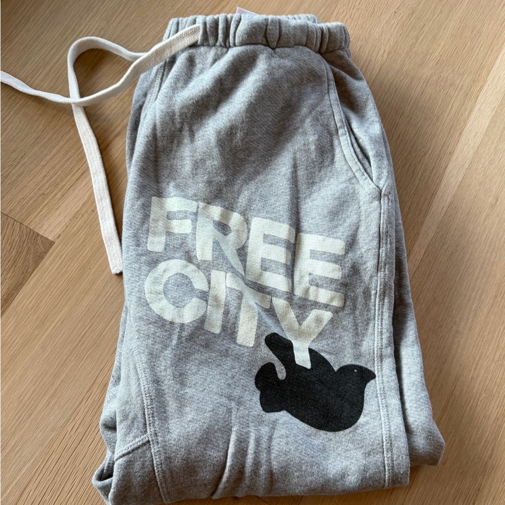 freecity Grey Sweatpants with White Logo and Black Dove Graphic